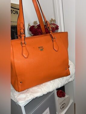 MCM Orange Pebbled Leather Tote with Gold-Tone Logo